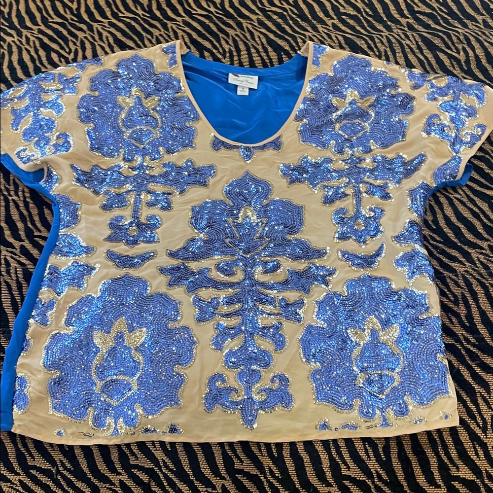 Niemen Marcus presents aTracy Reese, Blue and Cream and Gold shimmering Sequins